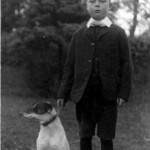 A young WILLIAM FREDERICK IVEY with family pets.